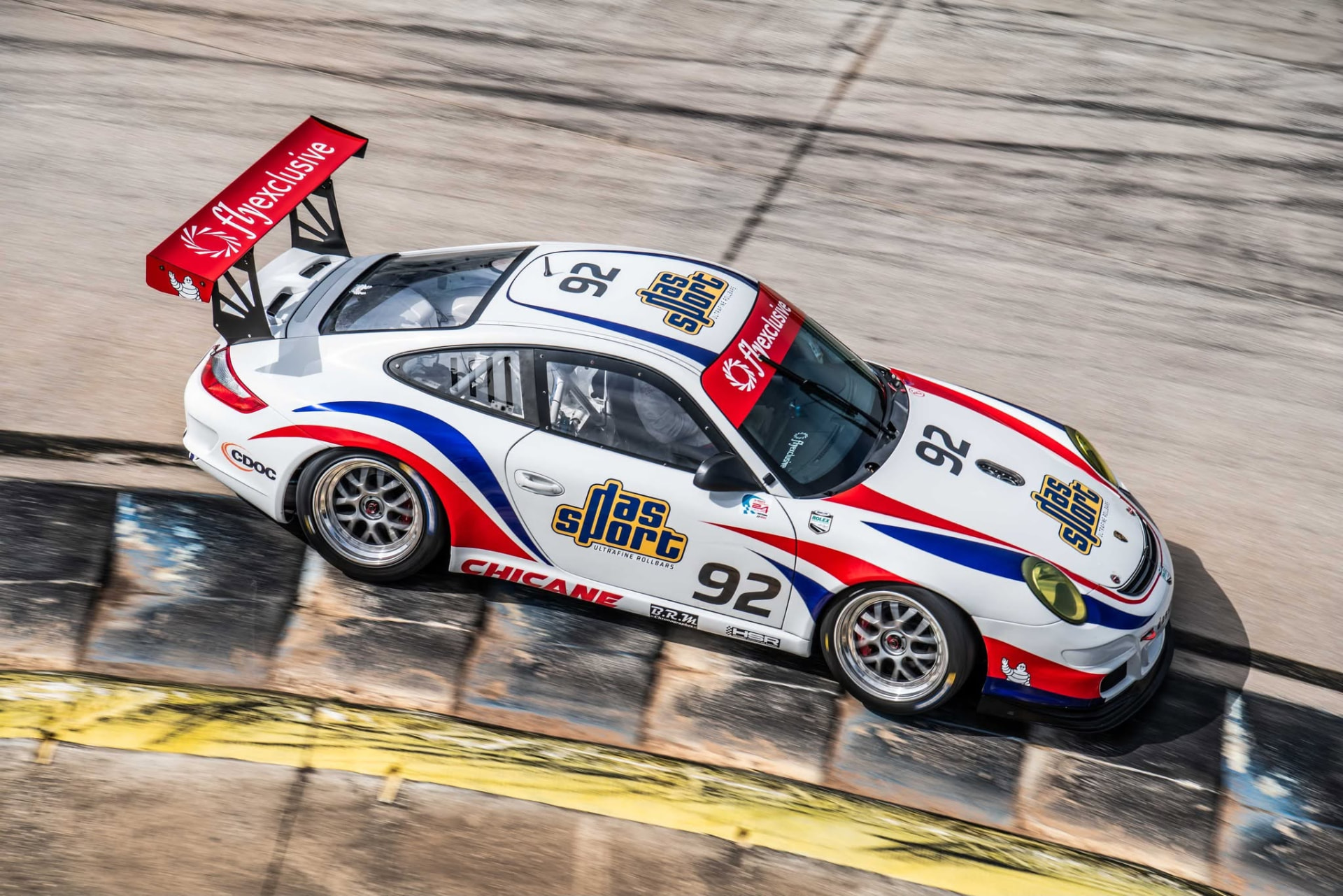 DAS Sport #92 Porsche 911 GT3 Cup car at speed on track